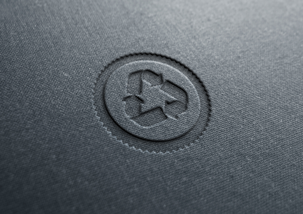 Recycle,Logo,Letterpressed,On,Cloth,Background.